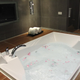 Image for article titled This Batman-themed hotel room rents by the hour for some reason